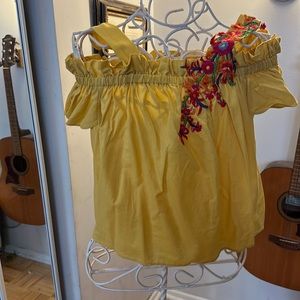 Anthropologie Yellow off the shoulder top with florals